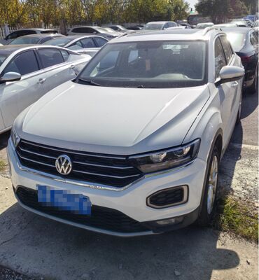 Volkswagen T-ROC 2023 280TSI DSG 2WD Time Edition usado con informes de pruebas de terceros.